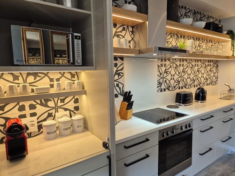 Luxury Cottage, 2 Bedrooms, Pool Access, City View (139 Waterkant Street 2 night min stay) | Private kitchen | Fridge, microwave, espresso maker, electric kettle