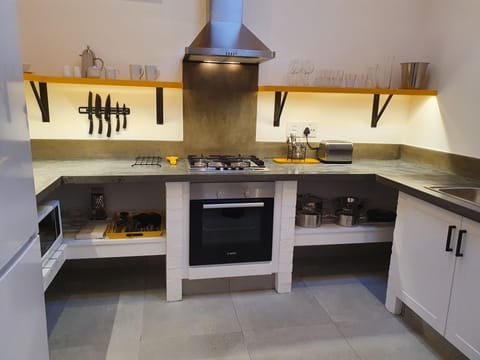 Cottage, 1 Bedroom, Private Courtyard, Outdoor Shower (165 Waterkant Street 2 night min stay) | Private kitchen | Fridge, microwave, espresso maker, electric kettle