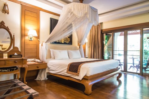 Deluxe Room, 1 King Bed, Pool Access (Lanna) | Premium bedding, pillowtop beds, minibar, in-room safe