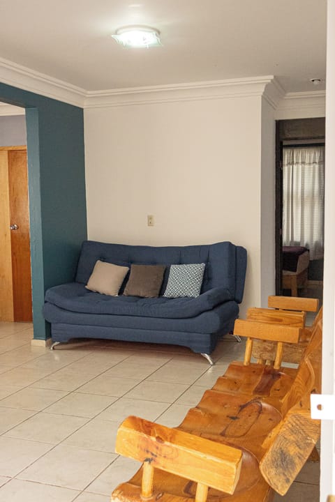 Family Triple Room | Living area | 32-inch flat-screen TV with digital channels, TV