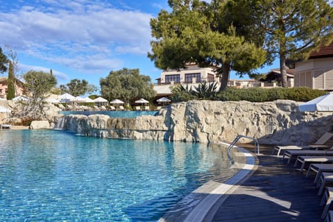 Indoor pool, outdoor pool, pool umbrellas, sun loungers