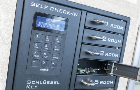 Check-in/check-out kiosk