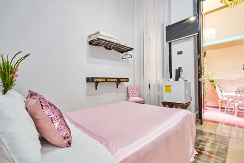 Standard Double Room, 1 Queen Bed, Non Smoking (Private bathroom outside of the room) | 1 bedroom, minibar, in-room safe, individually decorated