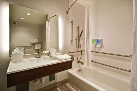 Studio, 1 King Bed, Accessible, Bathtub (Mobility & Hearing) | Bathroom | Rainfall showerhead, hair dryer, towels, soap