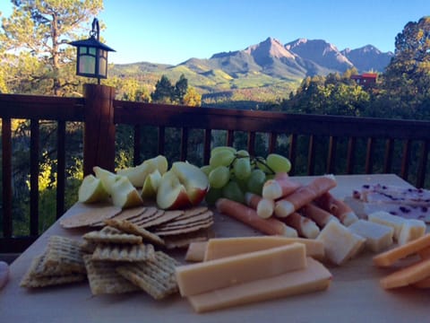 Two tables with umbrellas on the deck make it easy to sit back and enjoy life!