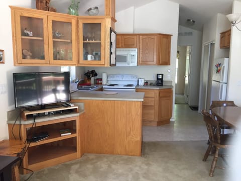 Kitchen and hall as viewed from living room