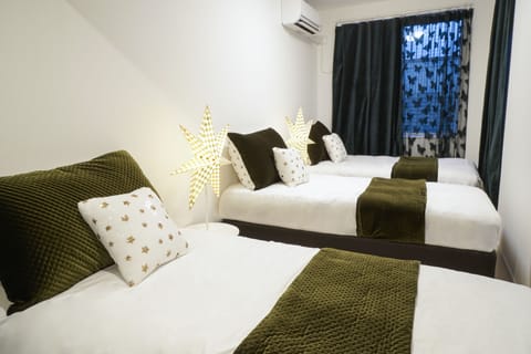 Triple Room | 2 bedrooms, desk, free WiFi, bed sheets