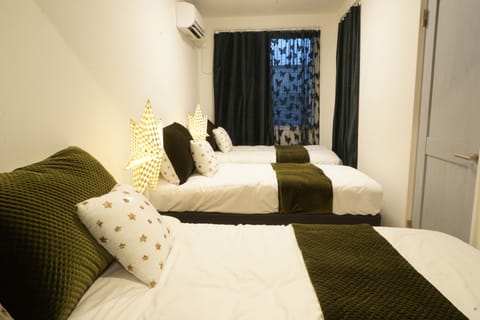 Family Room | 2 bedrooms, desk, free WiFi, bed sheets