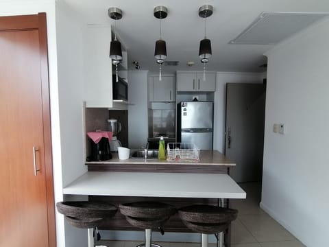 Executive Suite, 1 Bedroom, Ensuite, Ground Floor | Private kitchen | Full-size fridge, microwave, stovetop, coffee/tea maker