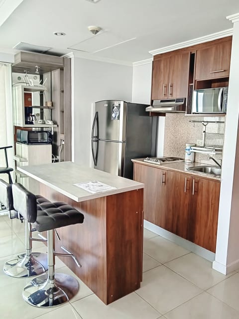 Premium Suite, 1 Bedroom, Ensuite, Ground Floor | Private kitchen | Full-size fridge, microwave, stovetop, coffee/tea maker