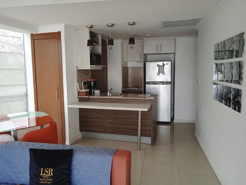 Premium Suite, 1 Bedroom, Ensuite, Ground Floor | Private kitchen | Full-size fridge, microwave, stovetop, coffee/tea maker