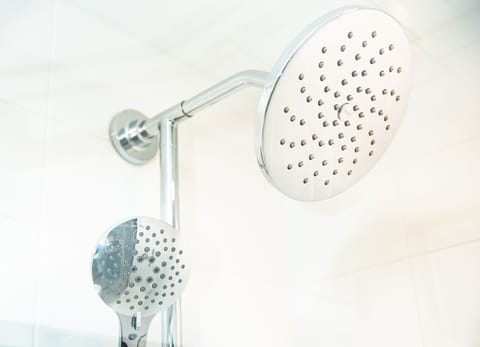 Shower, rainfall showerhead, designer toiletries, hair dryer