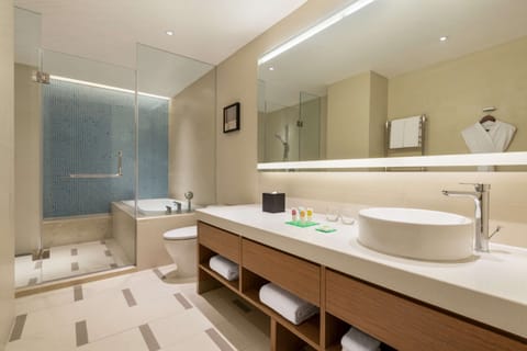 Room, City View (2 Twin Beds with Sofa bed) | Bathroom | Rainfall showerhead, designer toiletries, hair dryer, bathrobes