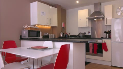 Premium Apartment, 2 Bedrooms | Private kitchen | Full-size fridge, microwave, oven, stovetop