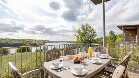 Sit out on your furnished terrace and enjoy a glass of wine in the warm sunshine. Please note that lake views are not guaranteed.