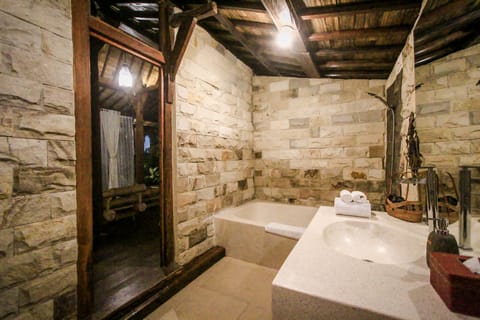 Suite, Pool View | Bathroom | Shower, rainfall showerhead, free toiletries, slippers