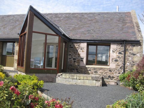 Thairn cottage has a south facing conservatory overlooking the cottage garden.