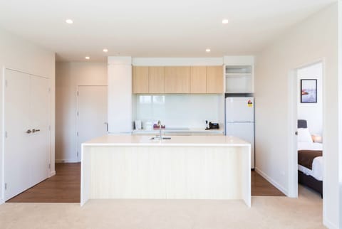 Premier Two Bedroom Suite with a free secure parking | Private kitchen | Full-size fridge, microwave, oven, stovetop