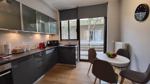 Deluxe Apartment, 2 Bedrooms, Balcony (B1) | Private kitchen | Stovetop, electric kettle, cookware/dishes/utensils