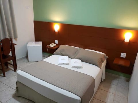 Casal Luxo | Minibar, desk, blackout drapes, free WiFi