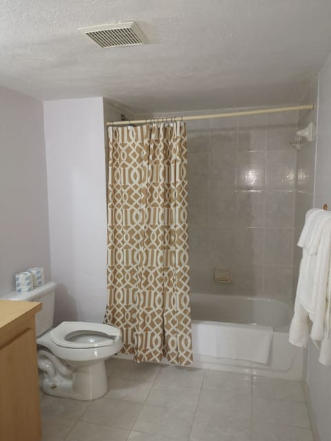 Basic Room, 2 Queen Beds, Non Smoking, Garden View | Bathroom | Shower, free toiletries, hair dryer, towels