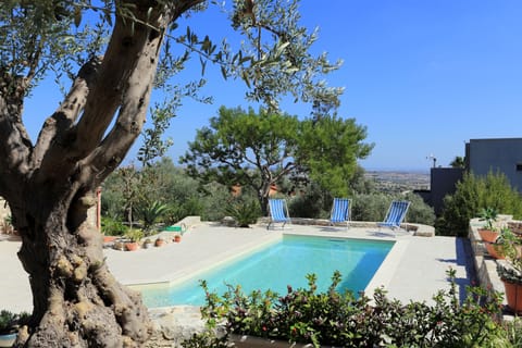 Seasonal outdoor pool, pool umbrellas, sun loungers