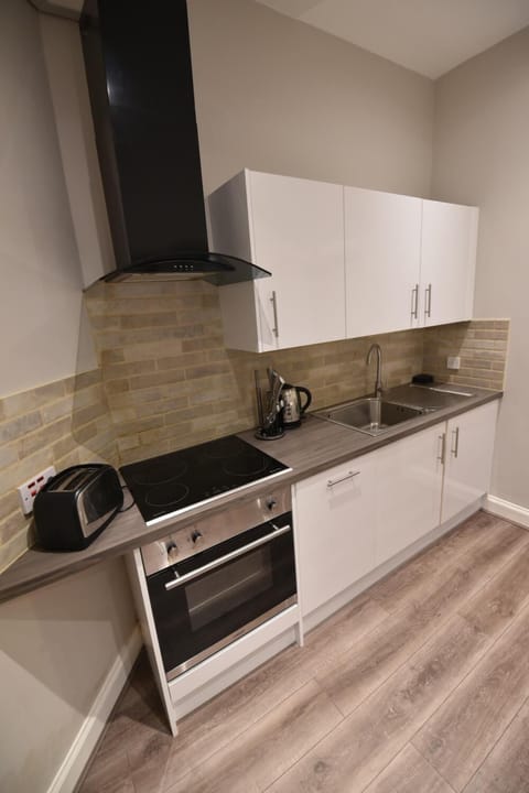 Classic Apartment, 1 King Bed with Sofa bed, Accessible, Garden View | Private kitchen | Full-size fridge, microwave, oven, stovetop