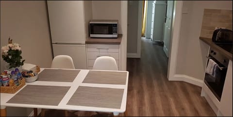 Classic Apartment, 1 King Bed with Sofa bed, Accessible, Garden View | Private kitchen | Full-size fridge, microwave, oven, stovetop