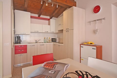 Apartment, 2 Bedrooms, Lake View | Private kitchen | Full-size fridge, microwave, stovetop, highchair