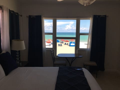 Deluxe Room, 1 King Bed, Kitchenette, Oceanfront | Iron/ironing board, free WiFi, bed sheets