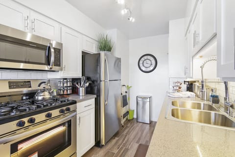 Stylish and functional, this modern kitchen boasts appliances.