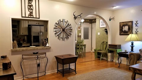 Beautiful archway leading into kitchen and dining room