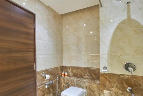 Luxury Room, 1 King Bed | Bathroom | Shower, rainfall showerhead, free toiletries, bathrobes