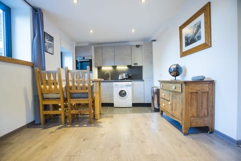 Lower Ground Floor Living Room with fitted kitchen.
