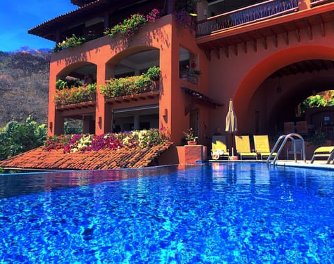 that's us right next to the pool a short distance to the bar and refrig!