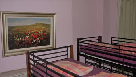 Single Bed in a 10 beds Female Dormitory | In-room safe, free WiFi, bed sheets