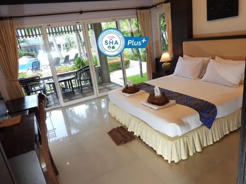 Bungalow, Pool View | Minibar, in-room safe, blackout drapes, free WiFi