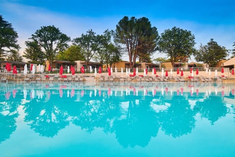 Outdoor pool, pool umbrellas, sun loungers