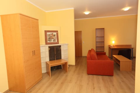 Apartment, 1 Bedroom | Living area | Flat-screen TV