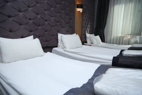 Standard Triple Room | 1 bedroom, memory foam beds, minibar, in-room safe