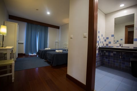 Twin Room, Private Bathroom | Blackout drapes, free WiFi, bed sheets