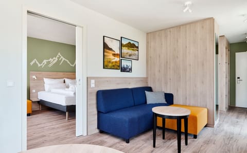 Suite | Living area | 50-inch LED TV with satellite channels, TV