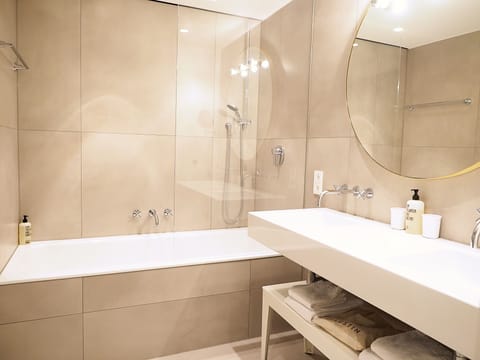 Shower, eco-friendly toiletries, heated floors, towels