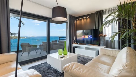 Deluxe Apartment, 2 Bedrooms, Balcony, Sea View | Living room | Smart TV
