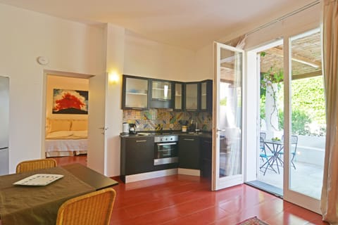 Apartment, 1 Bedroom, Garden Area (Levante) | Private kitchenette | Full-size fridge, microwave, espresso maker, coffee/tea maker