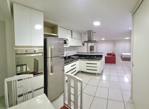 Exclusive Apartment | Private kitchen | Fridge, microwave, coffee/tea maker, dining tables