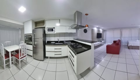 Exclusive Apartment | Private kitchen | Fridge, microwave, coffee/tea maker, dining tables