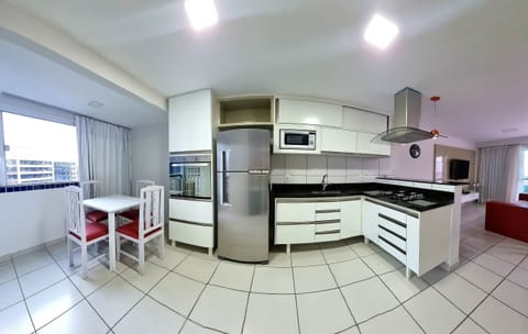 Exclusive Apartment | Private kitchen | Fridge, microwave, coffee/tea maker, dining tables