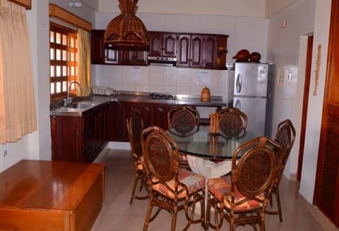 Family Apartment, Multiple Beds, Non Smoking | Private kitchen | Full-size fridge, stovetop, cookware/dishes/utensils