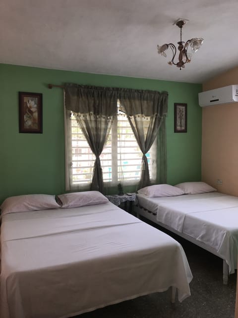 Standard Triple Room, Multiple Beds, Non Smoking | Iron/ironing board, bed sheets